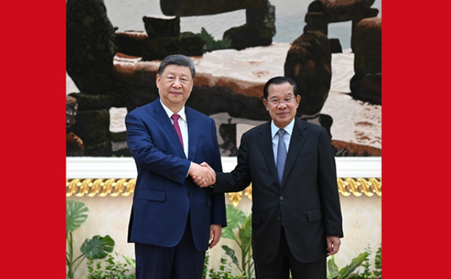 习近平会见柬埔寨人民党主席、参议院主席洪森
